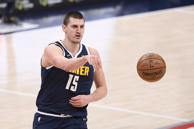 Denver Nuggets center Nikola Jokic (15) passes during the second half of an NBA basketball game against the Washington Wizards, Wednesday, Feb. 17, 2021, in Washington. (AP Photo/Nick Wass) Denver Nuggets center Nikola Jokic (15) passes during the second half of an NBA basketball game against the Washington Wizards, Wednesday, Feb. 17, 2021, in Washington. (AP Photo/Nick Wass)