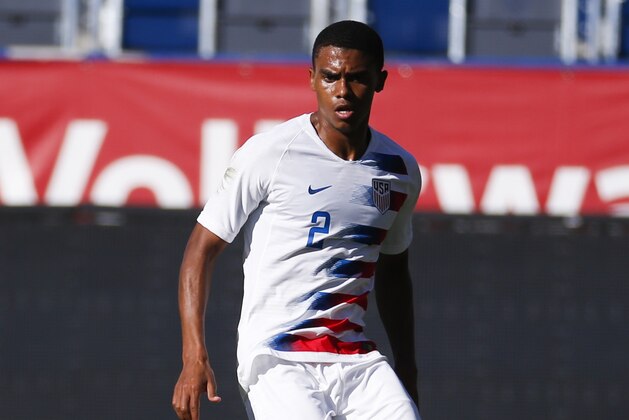 United States defender Reggie Cannon (2) drives the ball during an international friendly soccer match between United States and Costa Rica in Carson, Calif., Saturday, Feb. 1, 2020. The U.S. won 1-0. (AP Photo/Ringo H.W. Chiu)