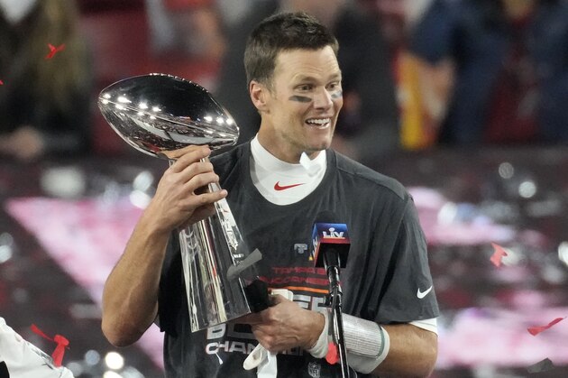 Tampa Bay Buccaneers quarterback Tom Brady celebrates with the Vince Lombardi Trophy after the NFL Super Bowl 55 football game against the Kansas City Chiefs Sunday, Feb. 7, 2021, in Tampa, Fla. The Buccaneers defeated the Chiefs 31-9 to win the Super Bowl. (AP Photo/Chris O'Meara)