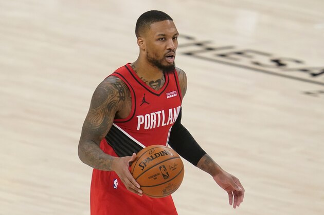 Portland Trail Blazers guard Damian Lillard (0) during an NBA basketball game against the Oklahoma City Thunder, Tuesday, Feb. 16, 2021, in Oklahoma City. (AP Photo/Sue Ogrocki)