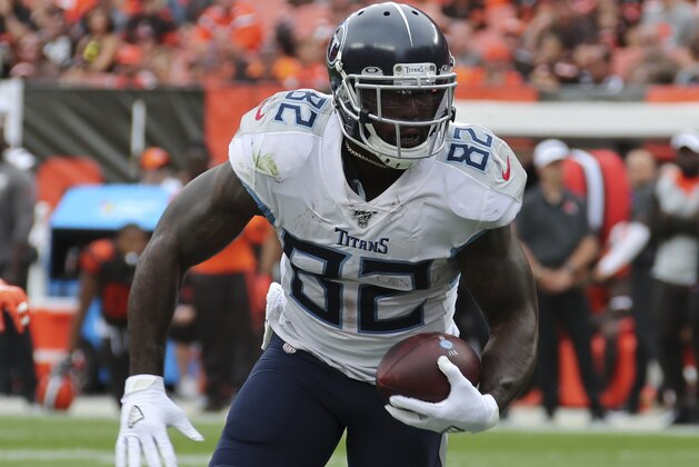 Tennessee Titans tight end Delanie Walker (82) scores a touchdown against the Cleveland Browns during the second half in an NFL football game, Sunday, Sept. 8, 2019, in Cleveland. (AP Photo/Ron Schwane)