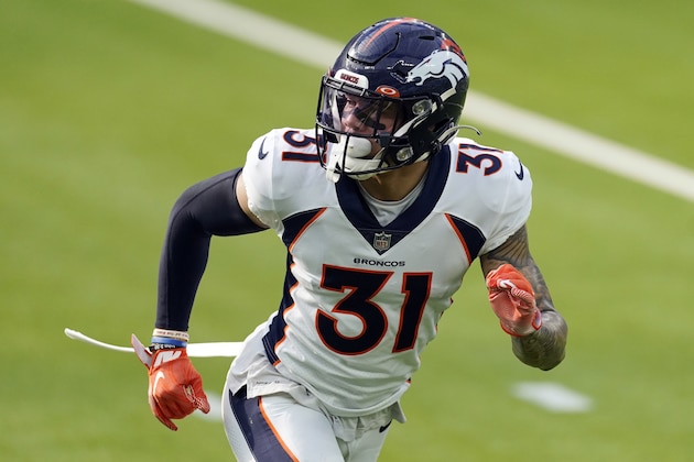 Denver Broncos free safety Justin Simmons warms up before an NFL football game against the Los Angeles Chargers Sunday, Dec. 27, 2020, in Inglewood, Calif. (AP Photo/Ashley Landis)