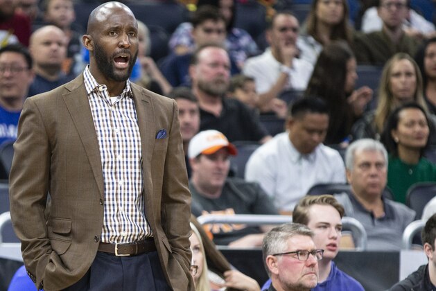 Atlanta Hawks head coach Lloyd Pierce coaches his players during the first half of an NBA basketball game against Orlando Magic in Orlando, Fla., Monday, Feb. 10, 2020. (AP Photo/Willie J. Allen Jr.)
