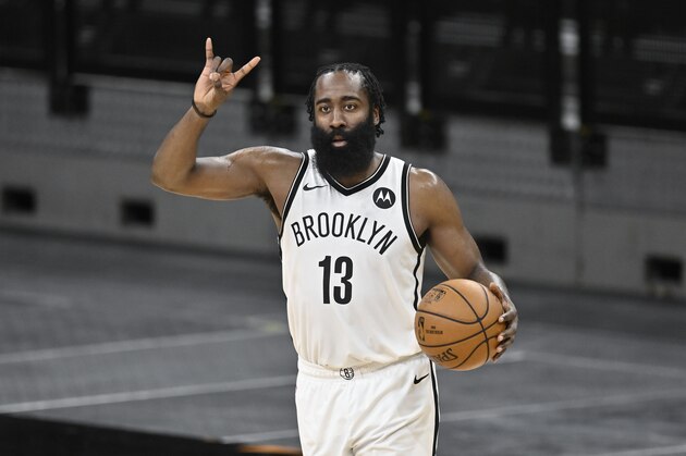 Brooklyn Nets' James Harden signals to teammates during the second half of an NBA basketball game against the San Antonio Spurs, Monday, March 1, 2021, in San Antonio. Brooklyn won 124-113. (AP Photo/Darren Abate)