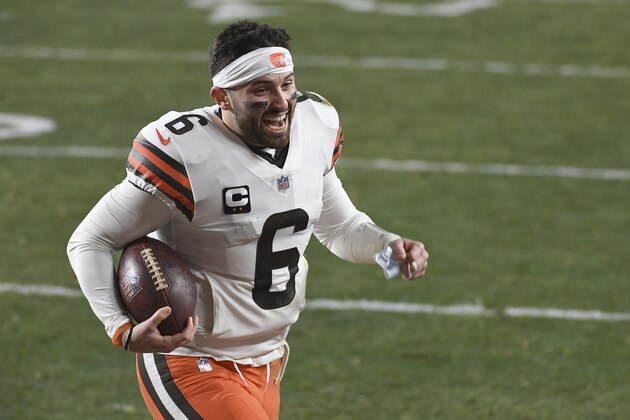 Cleveland Browns quarterback Baker Mayfield (6) reacts as he runs off the field after defeating the Pittsburgh Steelers 48-37 during an NFL wild-card playoff football game, Sunday, Jan. 10, 2021, in Pittsburgh. (AP Photo/Justin Berl)