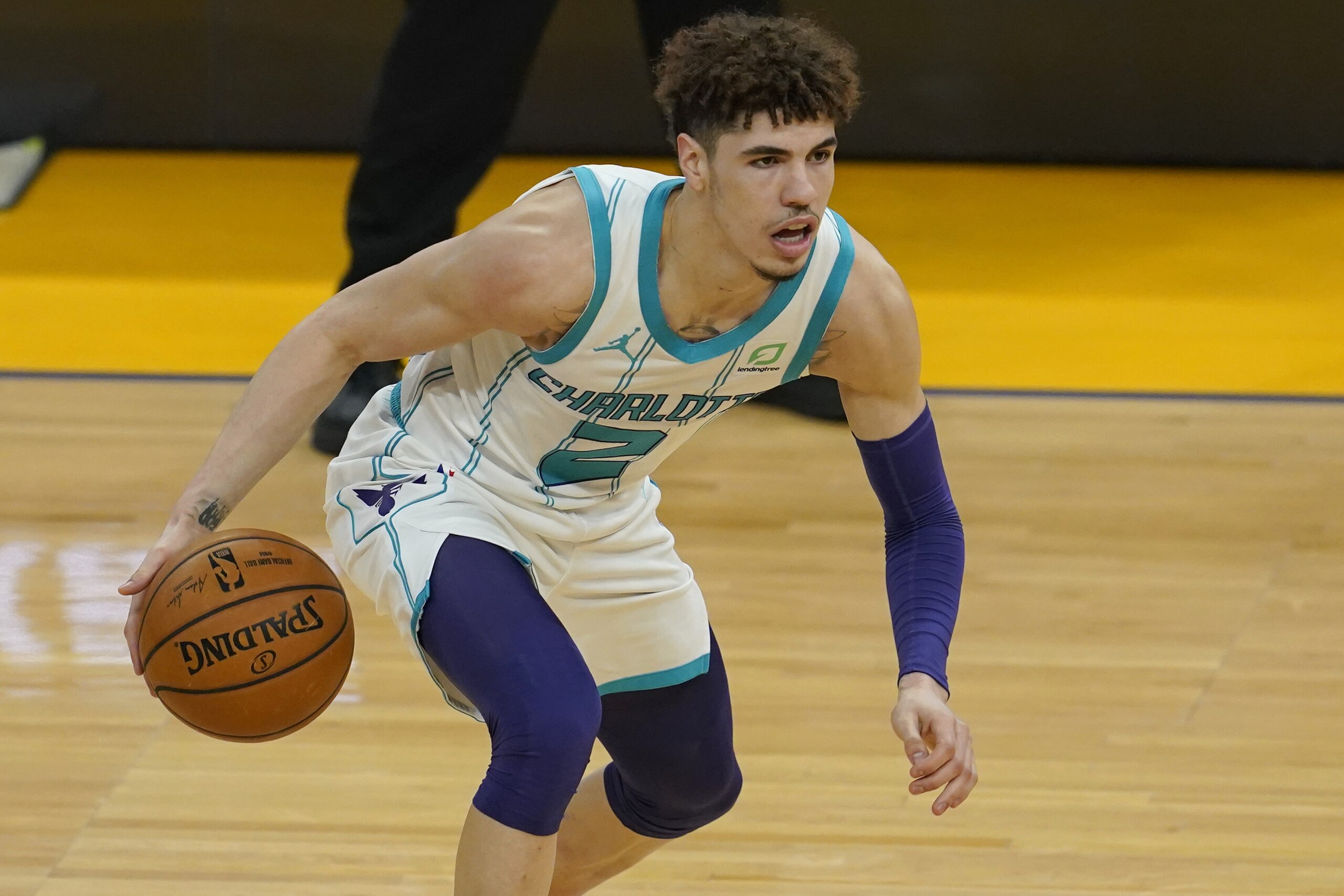 Charlotte Hornets guard LaMelo Ball during an NBA basketball game against the Golden State Warriors in San Francisco, Friday, Feb. 26, 2021. (AP Photo/Jeff Chiu) Charlotte Hornets guard LaMelo Ball during an NBA basketball game against the Golden State Warriors in San Francisco, Friday, Feb. 26, 2021. (AP Photo/Jeff Chiu)