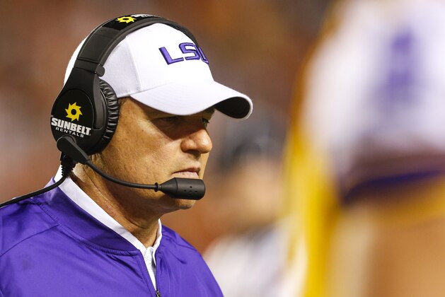LSU head coach Les Miles walks along the sidelines during the second half of an NCAA college football game against Auburn, Saturday, Sept. 24, 2016, in Auburn, Ala. (AP Photo/Butch Dill)
