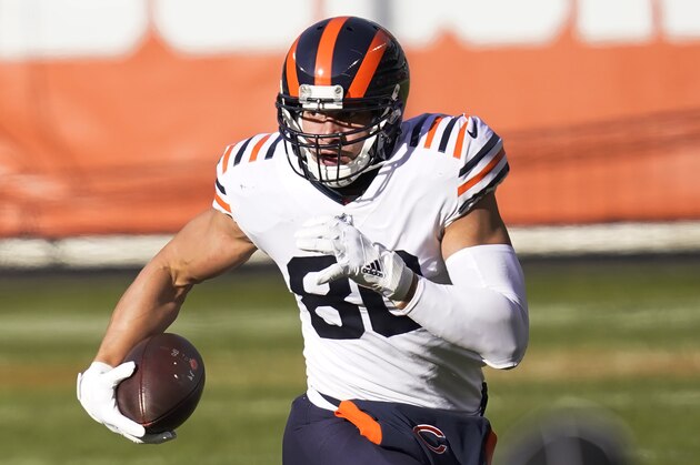 Chicago Bears tight-end Jimmy Graham advances the ball during an NFL football game against the Houston Texans, Sunday, Dec. 13, 2020, in Chicago. (AP Photo/Charles Rex Arbogast)
