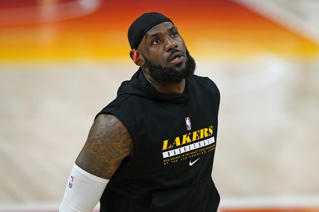 Los Angeles Lakers forward LeBron James warms up before theirNBA basketball game against the Utah Jazz Wednesday, Feb. 24, 2021, in Salt Lake City. (AP Photo/Rick Bowmer)