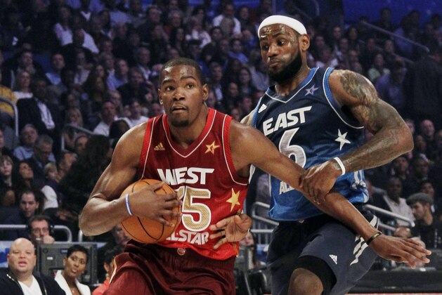 Eastern Conference's LeBron James (6), of the Miami Heat, pressures Western Conference's Kevin Durant (35), of the Oklahoma City Thunder, during the NBA All-Star basketball game, Sunday, Feb. 26, 2012, in Orlando, Fla. (AP Photo/Chris O'Meara)