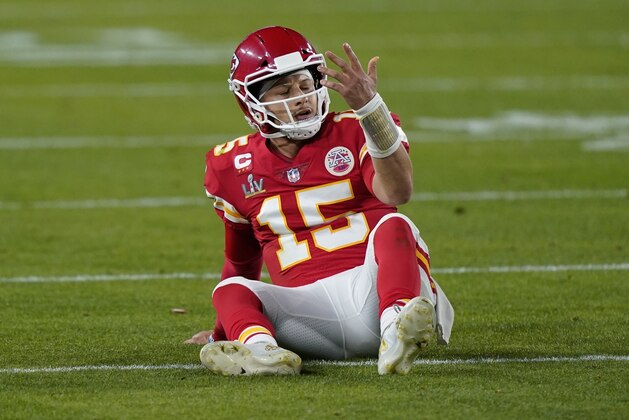 Kansas City Chiefs quarterback Patrick Mahomes sits on the field after a play against the Tampa Bay Buccaneers during the second half of the NFL Super Bowl 55 football game Sunday, Feb. 7, 2021, in Tampa, Fla. (AP Photo/Mark Humphrey)