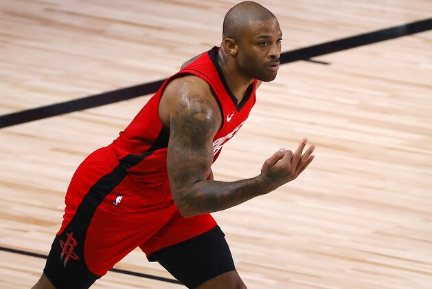 Houston Rockets' P.J. Tucker reacts to hi3 point basket during the first half against the Oklahoma City Thunder in Game 2 of an NBA basketball first-round playoff series, Thursday, Aug. 20, 2020, in Lake Buena Vista, Fla. (Kevin C. Cox/Pool Photo via AP)