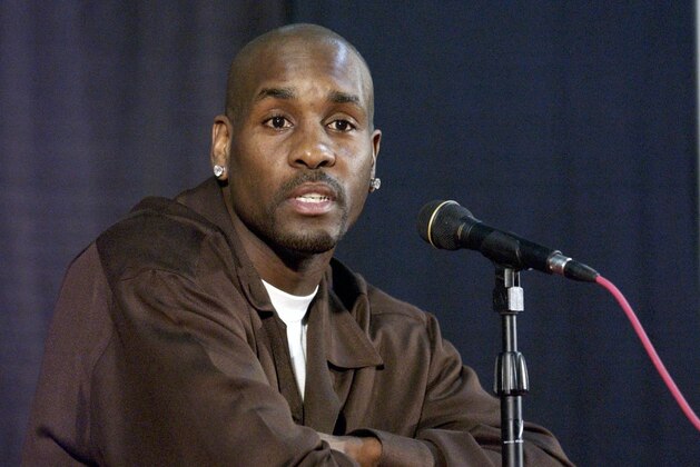 Milwaukee Bucks' Gary Payton speaks to reporters in Portland, Ore., Saturday, Feb. 22, 2003. Payton, a nine-time NBA All-Star, was scheduled to play his first game with the Bucks on Saturday night against the Portland Trail Blazers after being traded from the Seattle SuperSonics on Thursday. (AP Photo/Eric Cable)