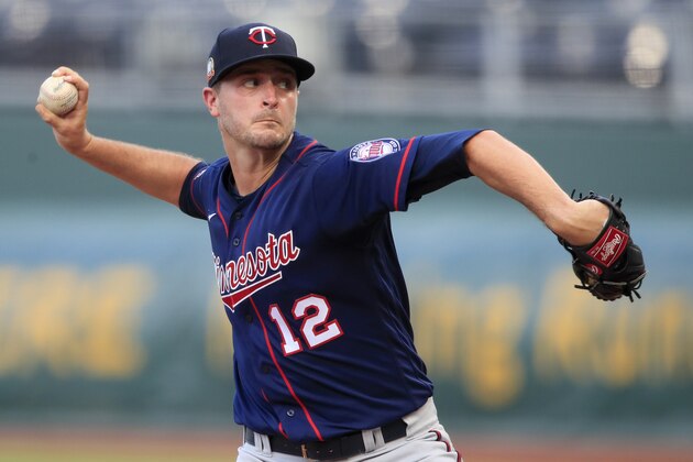 Minnesota Twins starting pitcher Jake Odorizzi delivers to a Kansas City Royals batter during the first inning of a baseball game at Kauffman Stadium in Kansas City, Mo., Saturday, Aug. 8, 2020. (AP Photo/Orlin Wagner)