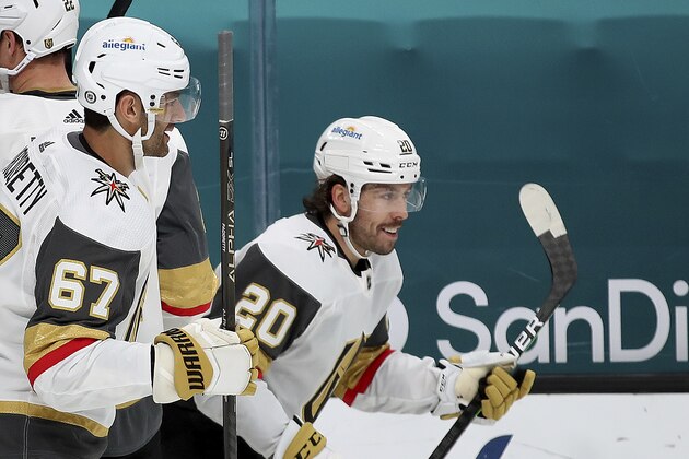 Vegas Golden Knights left wing Max Pacioretty (67) celebrates with center Chandler Stephenson (20), who scored a goal against the San Jose Sharks during the first period of an NHL hockey game in San Jose, Calif., Friday, March 5, 2021. (AP Photo/Josie Lepe)