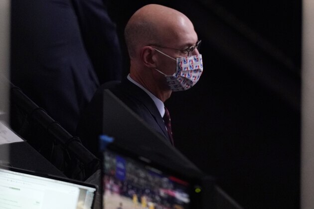 NBA Commissioner Adam Silver watches play as he attends the second half of Game 1 of basketball's NBA Finals Wednesday, Sept. 30, 2020, in Lake Buena Vista, Fla. (AP Photo/Mark J. Terrill)