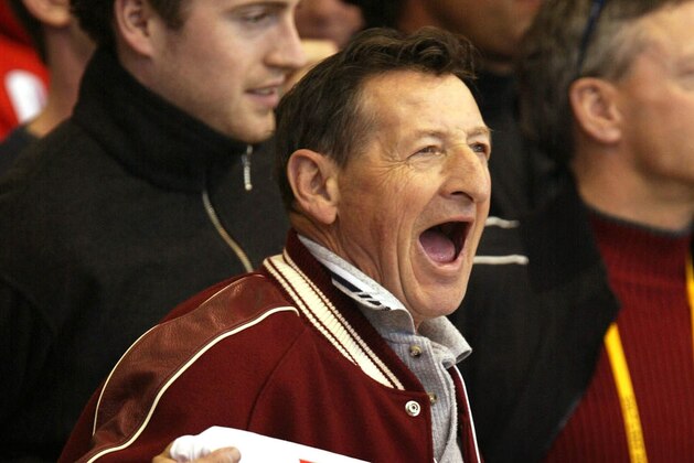 Walter Gretzky, father of Canadian hockey player Wayne Gretzky, yells encouragement from the stands at the start of the  Salt Lake City Winter Olympics hockey game between Canada and Germany in Provo, Utah, Sunday, Feb. 17, 2002. (AP Photo/Hans Deryk)