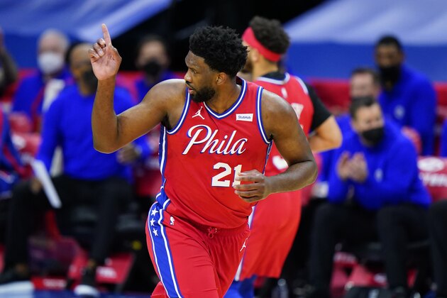 Philadelphia 76ers' Joel Embiid reacts after a basket during the second half of an NBA basketball game against the Utah Jazz, Wednesday, March 3, 2021, in Philadelphia. (AP Photo/Matt Slocum)