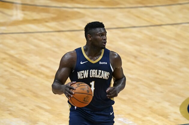New Orleans Pelicans forward Zion Williamson (1) moves the ball up court in the first half of an NBA basketball game against the Chicago Bulls in New Orleans, Wednesday, March 3, 2021. (AP Photo/Gerald Herbert)