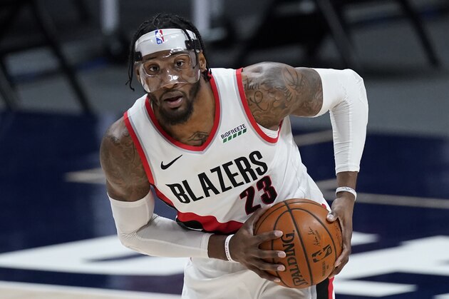 Portland Trail Blazers forward Robert Covington (23) in the second half of an NBA basketball game on Tuesday, Feb. 23, 2021, in Denver. The Nuggets won 111-106. (AP Photo/David Zalubowski)