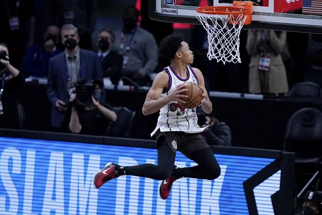 Portland Trail Blazers' Anfernee Simons competes in the Slam Dunk contest during basketball's NBA All-Star Game in Atlanta, Sunday, March 7, 2021. (AP Photo/Brynn Anderson)