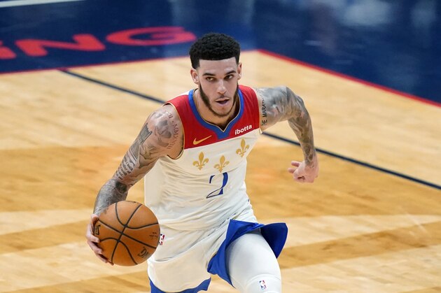 New Orleans Pelicans guard Lonzo Ball (2) advances the ball up court in the first half of an NBA basketball game against the Boston Celtics in New Orleans, Sunday, Feb. 21, 2021. (AP Photo/Gerald Herbert)