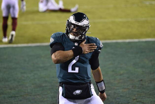 Philadelphia Eagles' Jalen Hurts celebrates after scoring a touchdown during the first half of an NFL football game against the Washington Football Team, Sunday, Jan. 3, 2021, in Philadelphia. (AP Photo/Derik Hamilton)