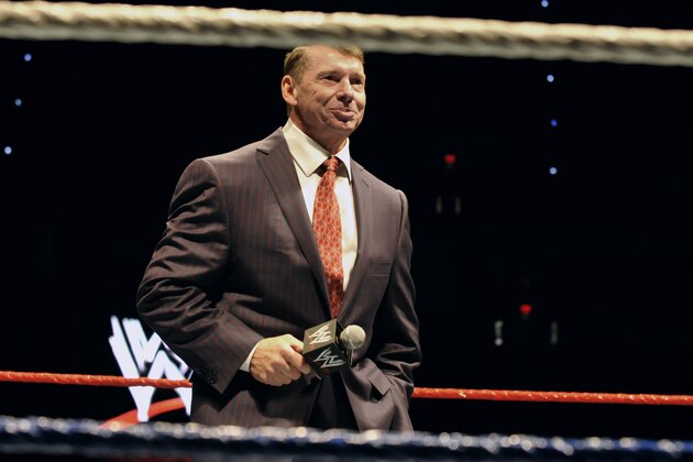 FILE - In this Oct. 30, 2010 file photo, WWE chairman and CEO Vince McMahon speaks to an audience during a WWE fan appreciation event in Hartford, Conn.   WWE's 'Raw' set out to be a special kind of wrestling show from its birth on Jan. 11, 1993.