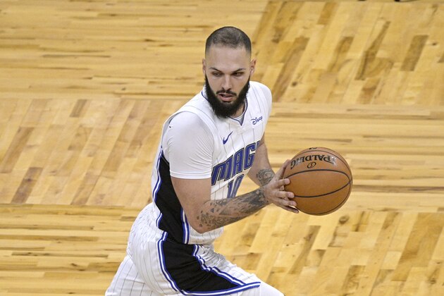 Orlando Magic guard Evan Fournier (10) steals the ball from New York Knicks guard Immanuel Quickley during the second half of an NBA basketball game, Wednesday, Feb. 17, 2021, in Orlando, Fla. (AP Photo/Phelan M. Ebenhack)