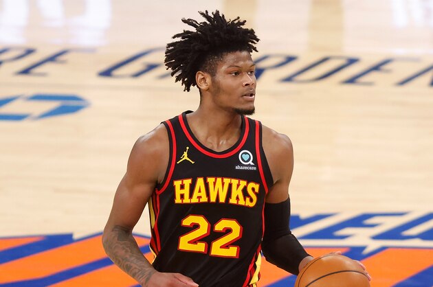 Atlanta Hawks' Cam Reddish (22) controls the ball against the New York Knicks during the fourth quarter of an NBA basketball game Monday, Feb. 15, 2021, in New York. (AP Photo/Jason DeCrow, Pool)