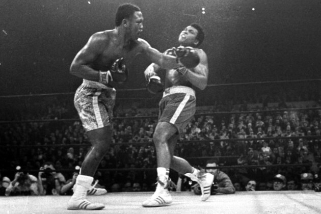 FILE - In this March 8, 1971, file photo, boxer Joe Frazier, left, hits Muhammad Ali during the 15th round of their heavyweight title fight at New York's Madison Square Garden. (AP Photo/File)