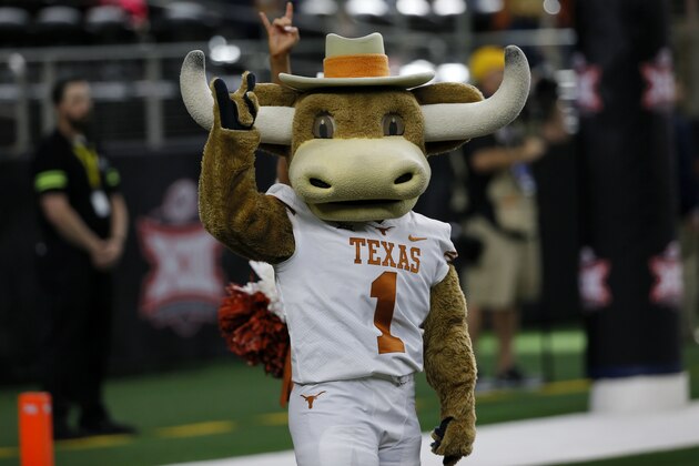 The Texas Longhorns mascot Hook 'Em performs on the field before the first half of the NCAA Big 12 Conference football championship against the Oklahoma Sooners, Saturday, Dec. 1, 2018, in Arlington, Texas. Oklahoma defeated Texas 39-27. (AP Photo/Roger Steinman)