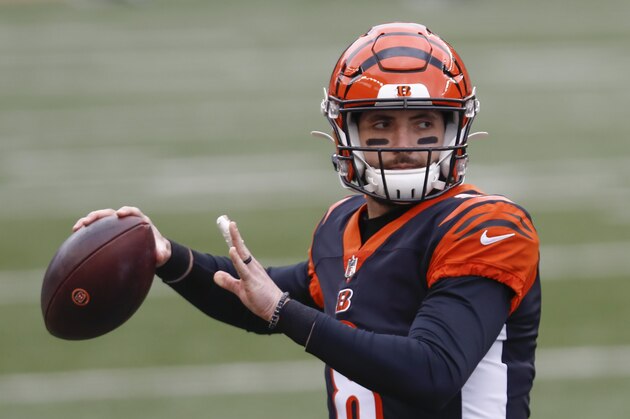 Cincinnati Bengals quarterback Brandon Allen (8) warms up before an NFL football game against the Baltimore Ravens, Sunday, Jan. 3, 2021, in Cincinnati. (AP Photo/Aaron Doster)