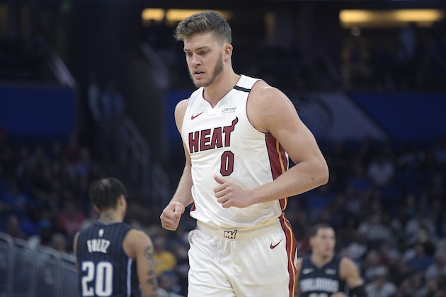 Miami Heat forward Meyers Leonard (0) runs up the court after a play during the first half of an NBA basketball game against the Orlando Magic Friday, Jan. 3, 2020, in Orlando, Fla. (AP Photo/Phelan M. Ebenhack)