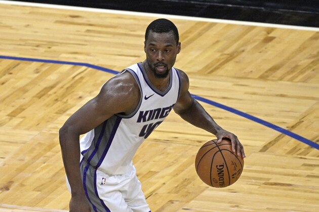 Sacramento Kings forward Harrison Barnes (40) sets up a play during the second half of an NBA basketball game against the Orlando Magic, Wednesday, Jan. 27, 2021, in Orlando, Fla. (AP Photo/Phelan M. Ebenhack)