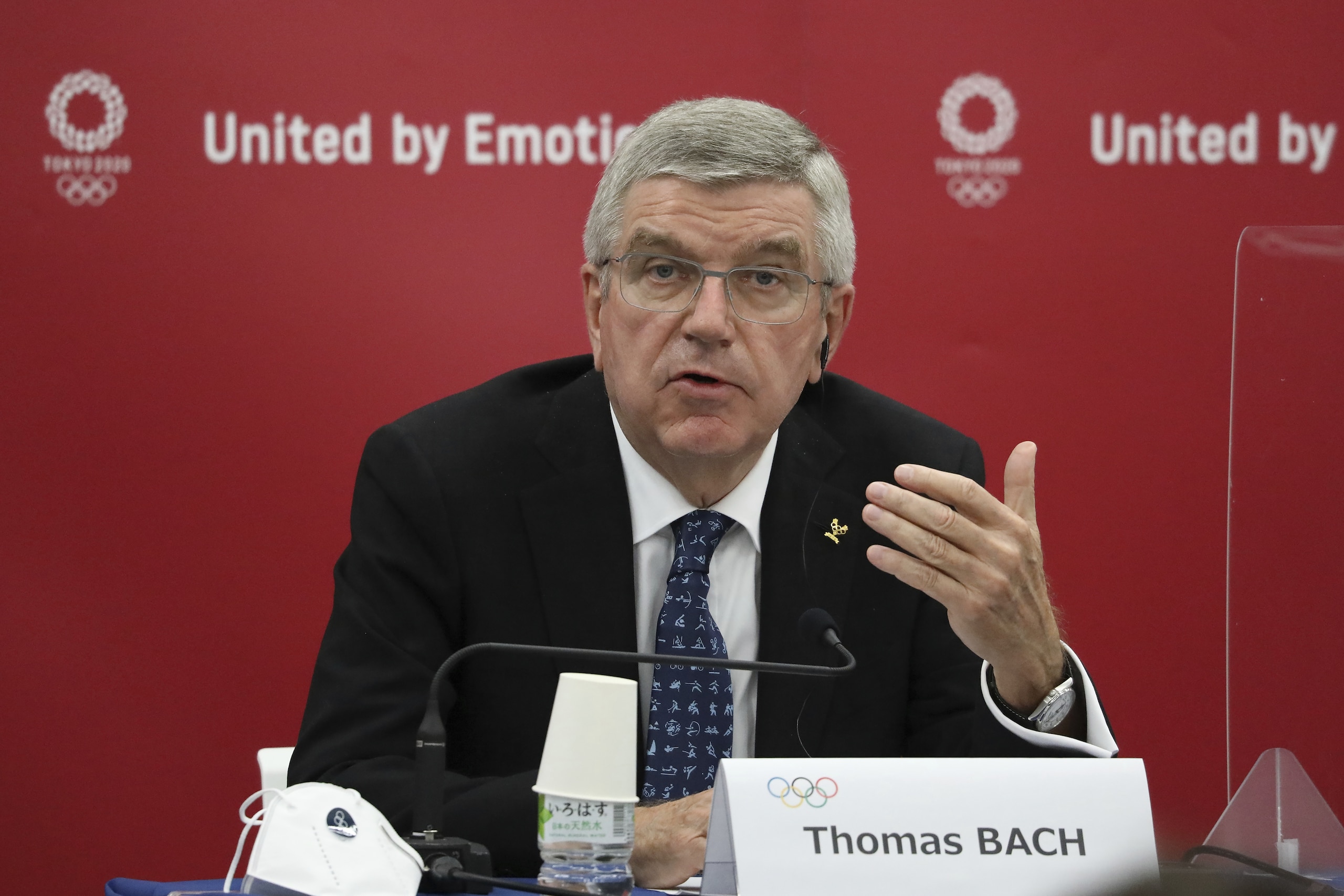 Thomas Bach, International Olympic Committee (IOC) President, speaks during the joint press conference between IOC and Tokyo Organizing Committee of the Olympic and Paralympic Games (Tokyo 2020) in Tokyo, Japan, Nov. 16, 2020. Olympic participants and fans arriving for next year's postponed Tokyo Olympics are likely to face requirements to be vaccinated to protect the Japanese public, Bach said Monday after meeting with new Prime Minister Yoshihide Suga. (Du Xiaoyi/Pool Photo via AP)