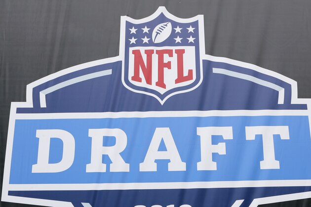 The logo for the 2019 NFL Draft is seen on a banner in Nashville on Tuesday, April 23, 2019. (AP Photo/Gregory Payan)