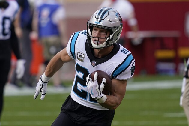 Carolina Panthers running back Christian McCaffrey (22) warms up before an NFL football game against the Kansas City Chiefs in Kansas City, Mo., Sunday, Nov. 8, 2020. (AP Photo/Jeff Roberson)