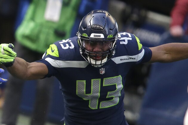Seattle Seahawks defensive end Carlos Dunlap II (43) in action against the Los Angeles Rams during the first half of an NFL football game, Sunday, Dec. 27, 2020, in Seattle. (AP Photo/Scott Eklund)
