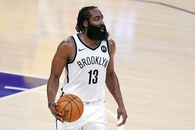 Brooklyn Nets guard James Harden dribbles during an NBA basketball game against the Los Angeles Lakers Thursday, Feb. 18, 2021, in Los Angeles. (AP Photo/Marcio Jose Sanchez)