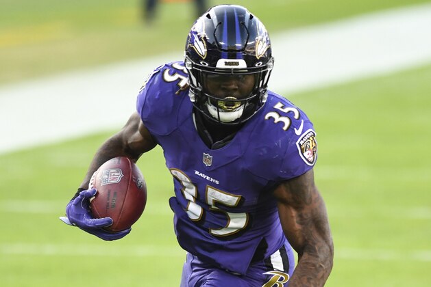 Baltimore Ravens running back Gus Edwards (35) runs the ball during the second half of an NFL football game against the New York Giants, Sunday, Dec. 27, 2020, in Baltimore. (AP Photo/Terrance Williams) Baltimore Ravens running back Gus Edwards (35) runs the ball during the second half of an NFL football game against the New York Giants, Sunday, Dec. 27, 2020, in Baltimore. (AP Photo/Terrance Williams)