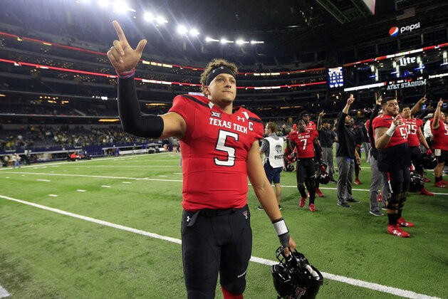 FILE - In this Nov. 25, 2016, file photo, Texas Tech quarterback Patrick Mahomes II celebrates after Tech defeated Baylor in an NCAA college football game in Arlington, Texas. When Kansas City Chiefs general manager John Dorsey and coach Andy Reid boldly jumped up 17 spots to select Mahomes with the 10th overall pick last week, they did so gambling that he will be their franchise quarterback long into the future.  (AP Photo/Ron Jenkins, File)