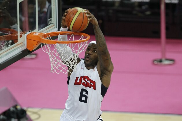 United States' LeBron James dunks against Spain's Serge Ibaka during the men's gold medal basketball game at the 2012 Summer Olympics, Sunday, Aug. 12, 2012, in London. (AP Photo/Matt Slocum)