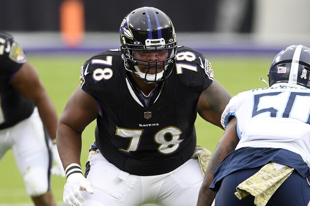 Baltimore Ravens offensive tackle Orlando Brown (78) defends against Tennessee Titans linebacker Derick Roberson (50) during the second half of an NFL football game, Sunday, Nov. 22, 2020, in Baltimore. (AP Photo/Nick Wass)