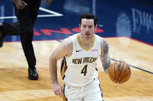New Orleans Pelicans guard JJ Redick (4) moves the ball up court in the first half of an NBA basketball game against the Utah Jazz in New Orleans, Monday, March 1, 2021. (AP Photo/Gerald Herbert)