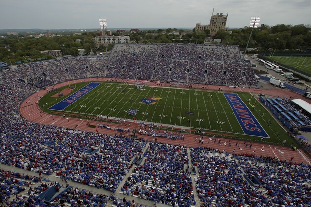 TCU and Kansas play during the second half of an NCAA college football game Saturday, Sept. 15, 2012, in Lawrence, Kan. TCU won the game 20-6. (AP Photo/Charlie Riedel)