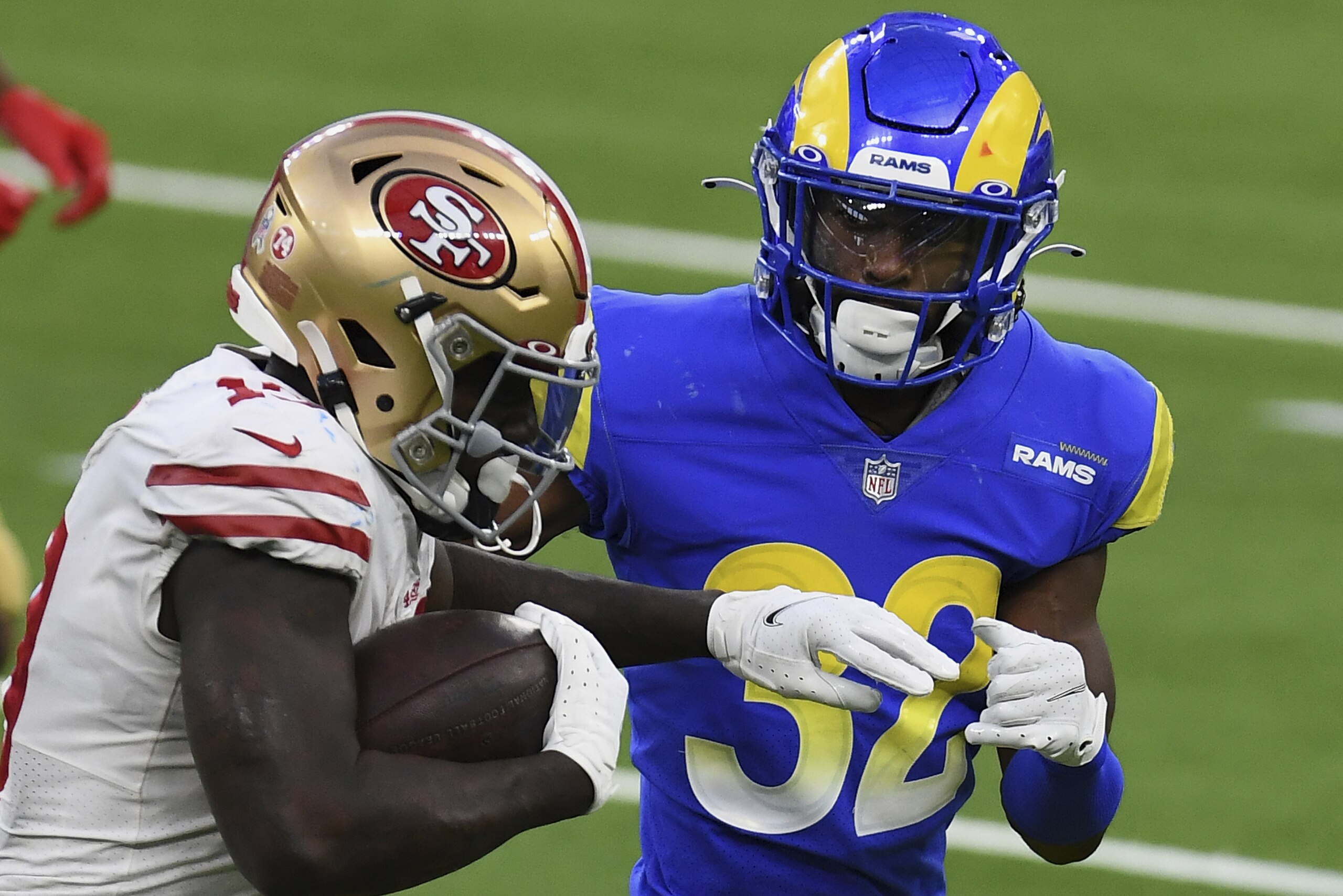 Los Angels Rams safety Jordan Fuller (32) chases after San Francisco 49es wide receiver Deebo Samuel (19) during an NFL football game against the 49ers, Sunday, November 29, 2020 in Inglewood, Calif. The 49ers defeated the Rams 23-20. (John Cordes/AP Images for Panini)