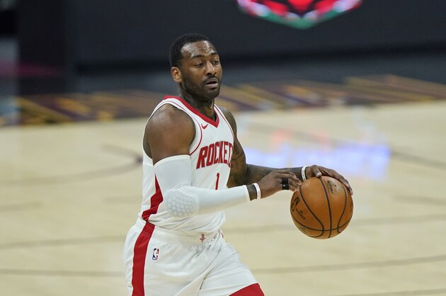 Houston Rockets' John Wall drives in the second half of an NBA basketball game against the Cleveland Cavaliers, Wednesday, Feb. 24, 2021, in Cleveland. (AP Photo/Tony Dejak)