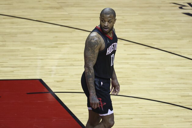Houston Rockets forward P.J. Tucker (17) reacts after a play during the second quarter of an NBA basketball game against the Memphis Grizzlies, Sunday, Feb. 28, 2021, in Houston. (Troy Taormina/Pool Photo via AP)