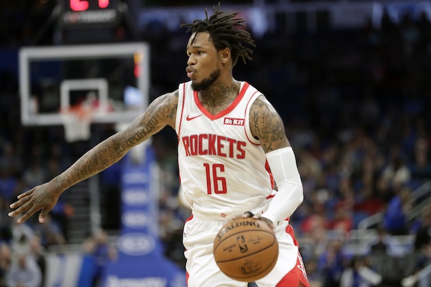 Houston Rockets' Ben McLemore moves the ball against the Orlando Magic during the first half of an NBA basketball game, Friday, Dec. 13, 2019, in Orlando, Fla. (AP Photo/John Raoux)